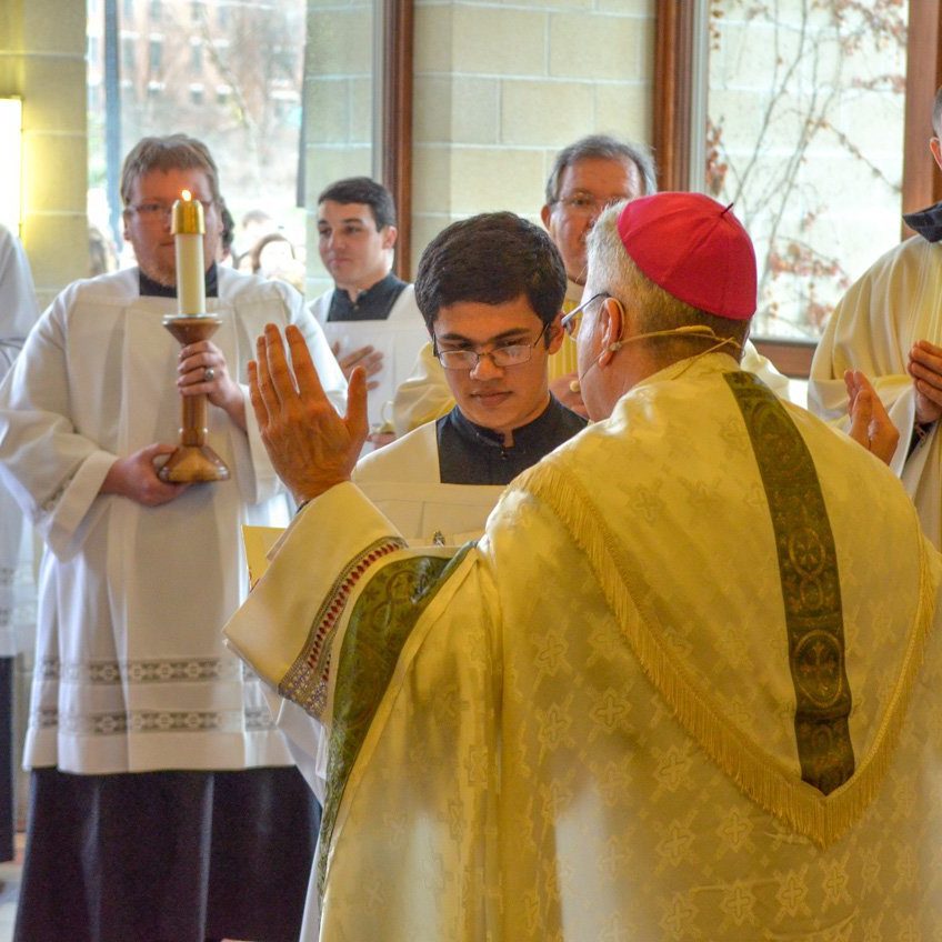 bishop montforton addressing the people before opening the holy door in christ the king chapel