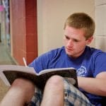 student studying Egan Hallway