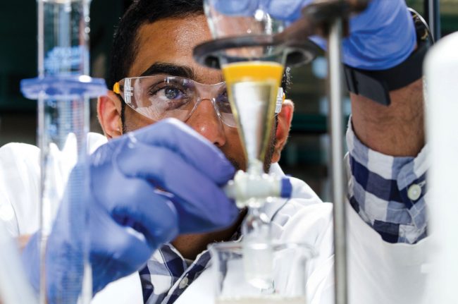 student doing chemistry