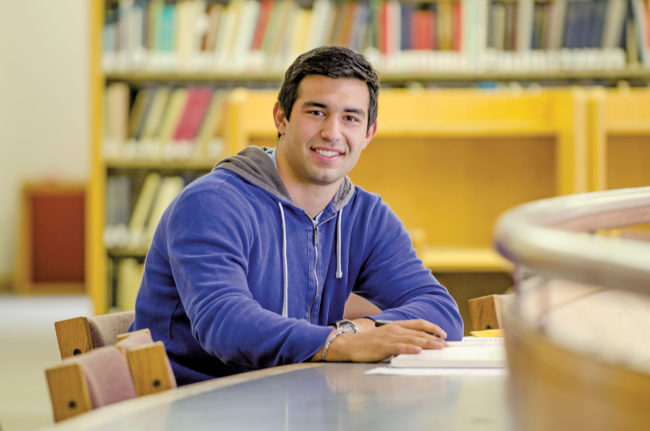 Student studying in library