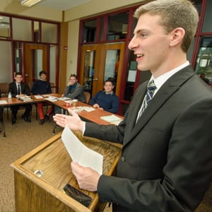 Student presenting for business