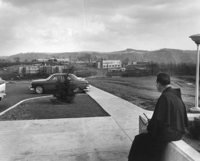 Fr. Keelan overlooking old campus