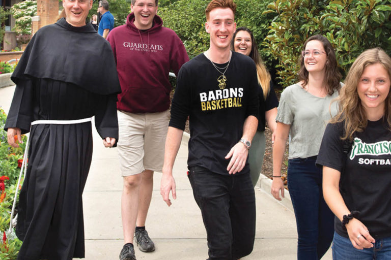 Father Dave Walking with Students