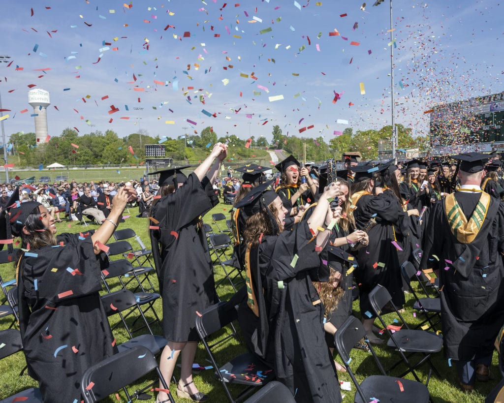 Graduates of Franciscan University’s Bachelor of Science in Nursing Program celebrate being called to the stage to receive their diplomas.