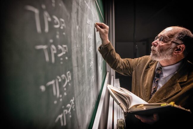 Professor Writing on a chalkboard