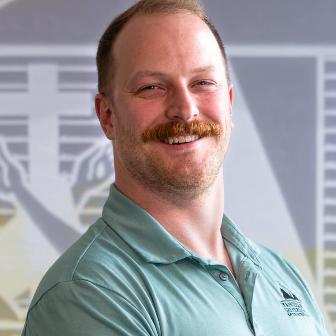 Headshot of Christian May.
