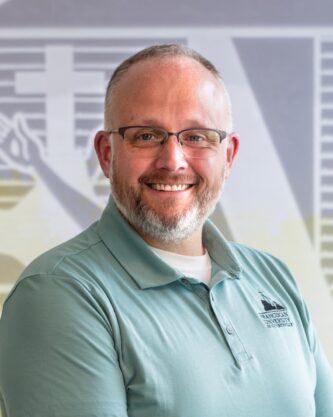 Headshot of Tim Reardon.