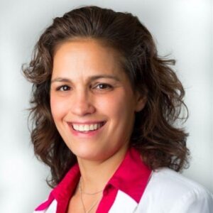 Headshot of Dr. Marguerite Duane on a white background. 