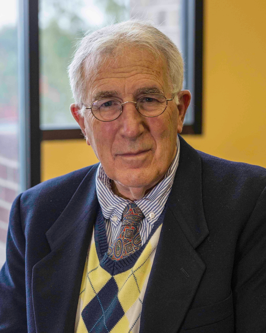 Dr. Regis Martin