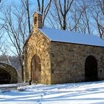 front of the portiuncula in the snow