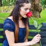pastoral counseling student smelling Rose