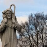 Shepherd holding the lamb statue