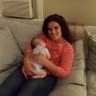 Student holding baby