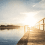 Dock with the sun over it