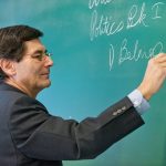 Dr. Healy Using Chalkboard