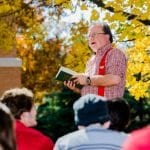 Dr Holmes teaching class outside