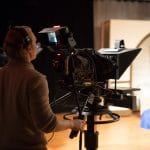Student operating video camera