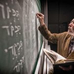 Professor Writing on a chalkboard
